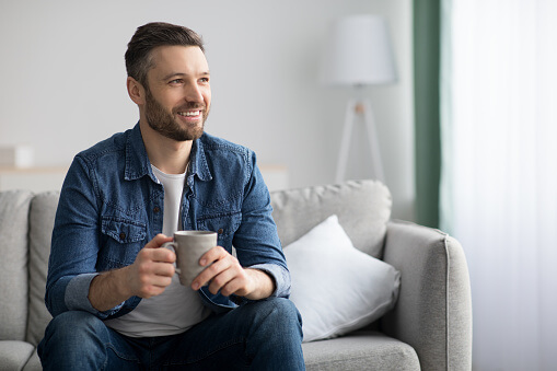 Happy Man drinking coffee